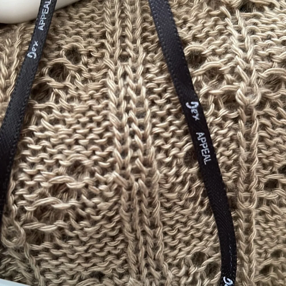 Dex tan cardigan with 3/4 sleeves. S/P. Nice condition. Long.